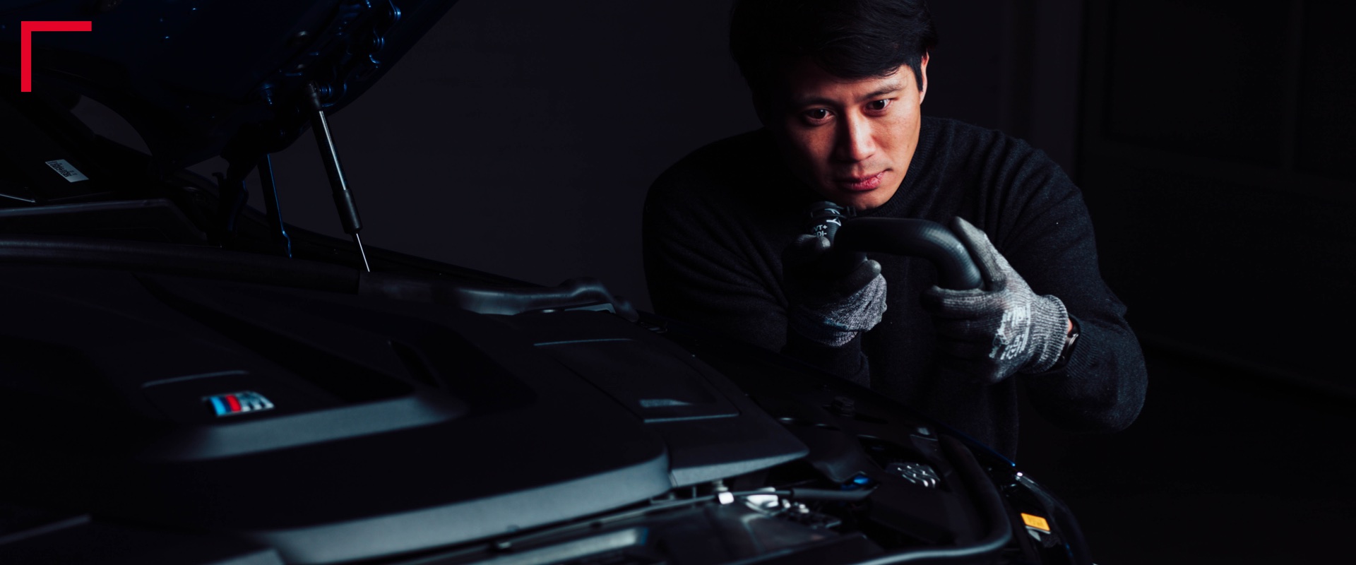 Closeup of person working on car